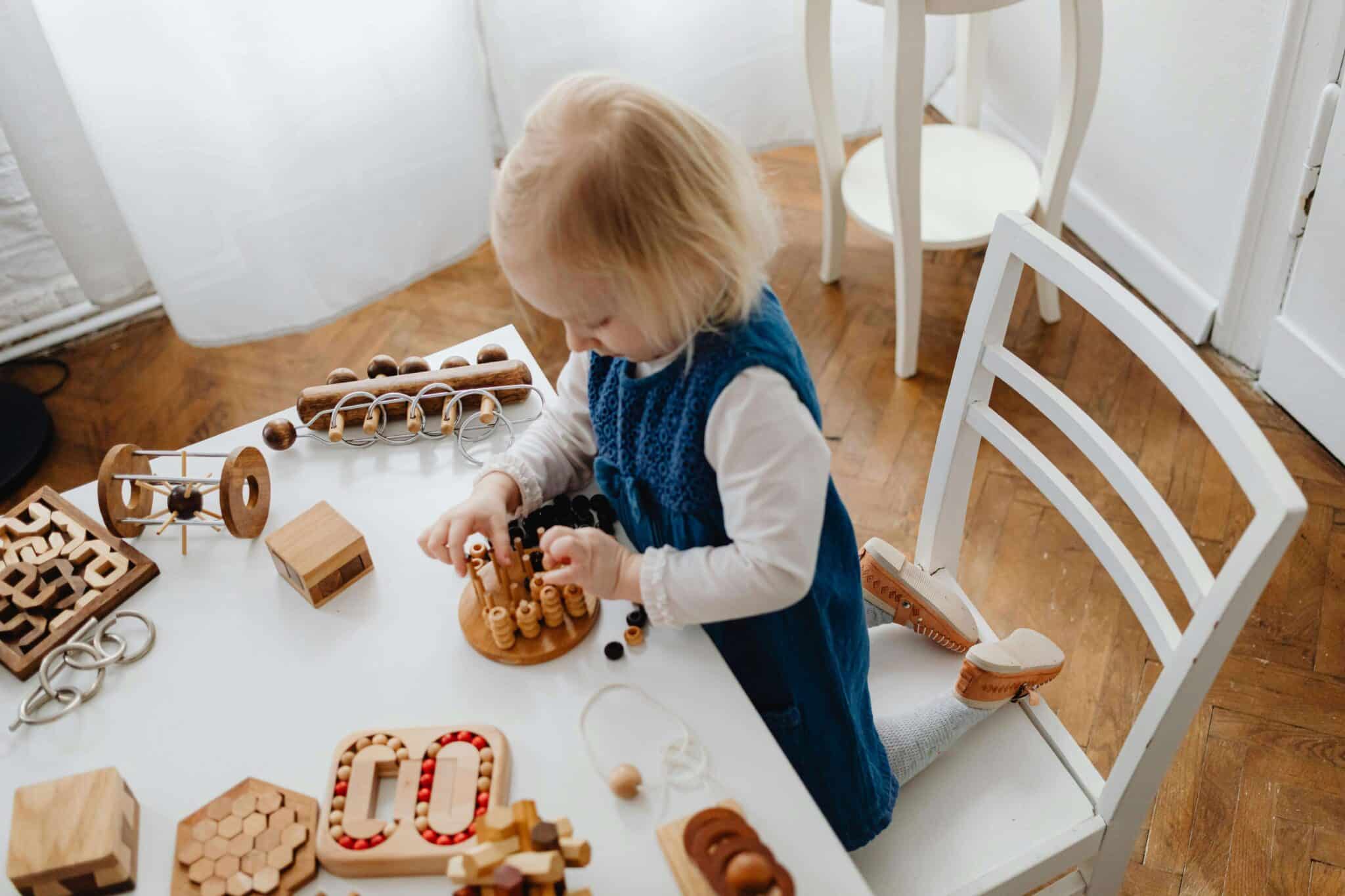 The golden period of learning, a toddler playing with educational toys