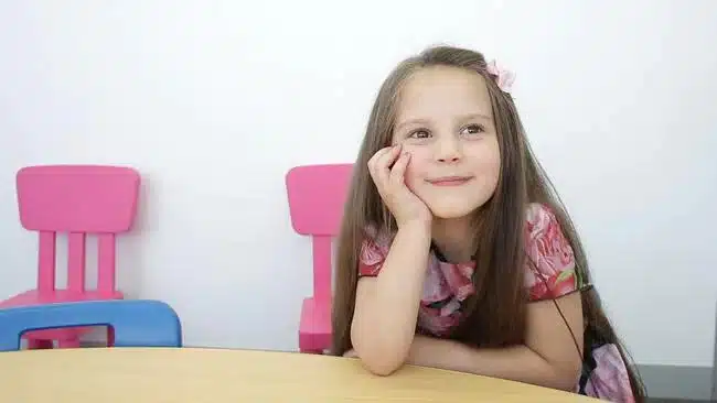 Girl patiently waiting for her brain training class to begin