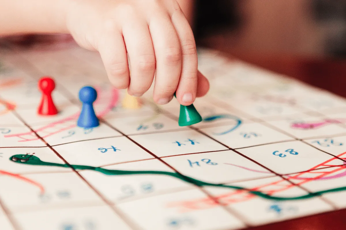 Snakes and ladders board game