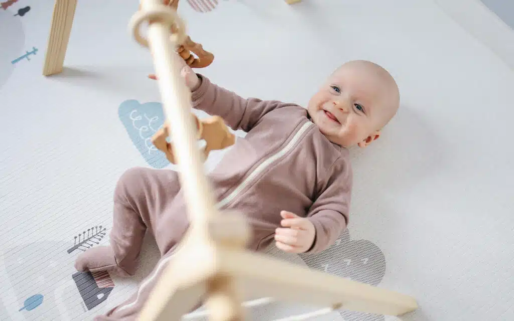 A happy baby. Baby Brain Development happens rapidly during the early years