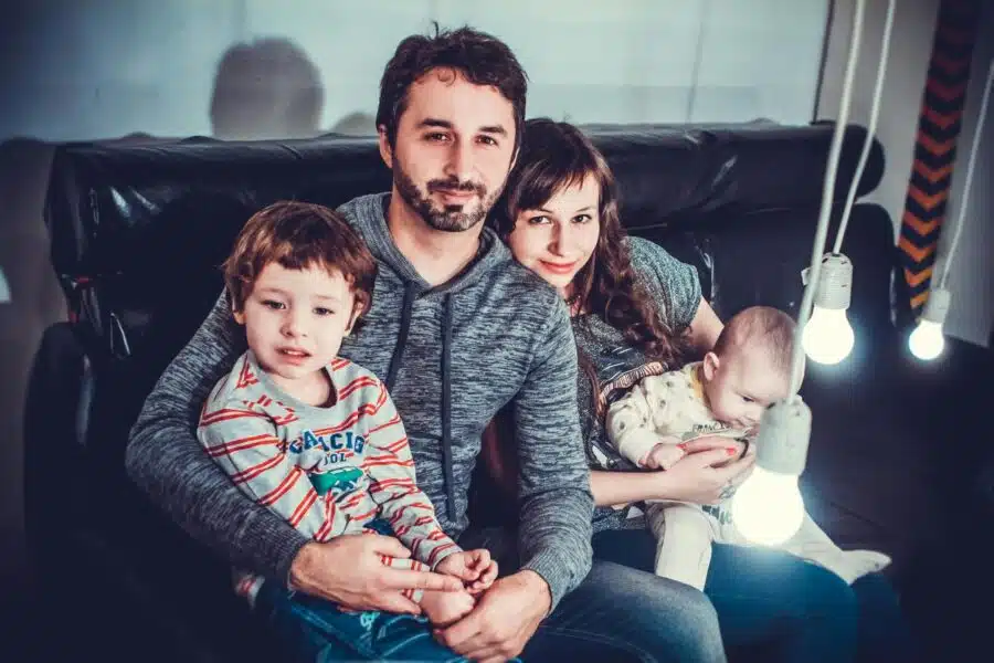 5 Common Parenting Mistakes featuring a mum, dad and two young kids