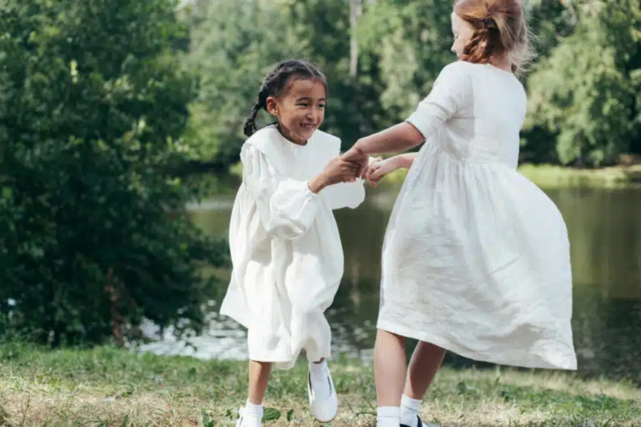 Emotional Intelligence - children playing together while laughing, clearly getting along well!