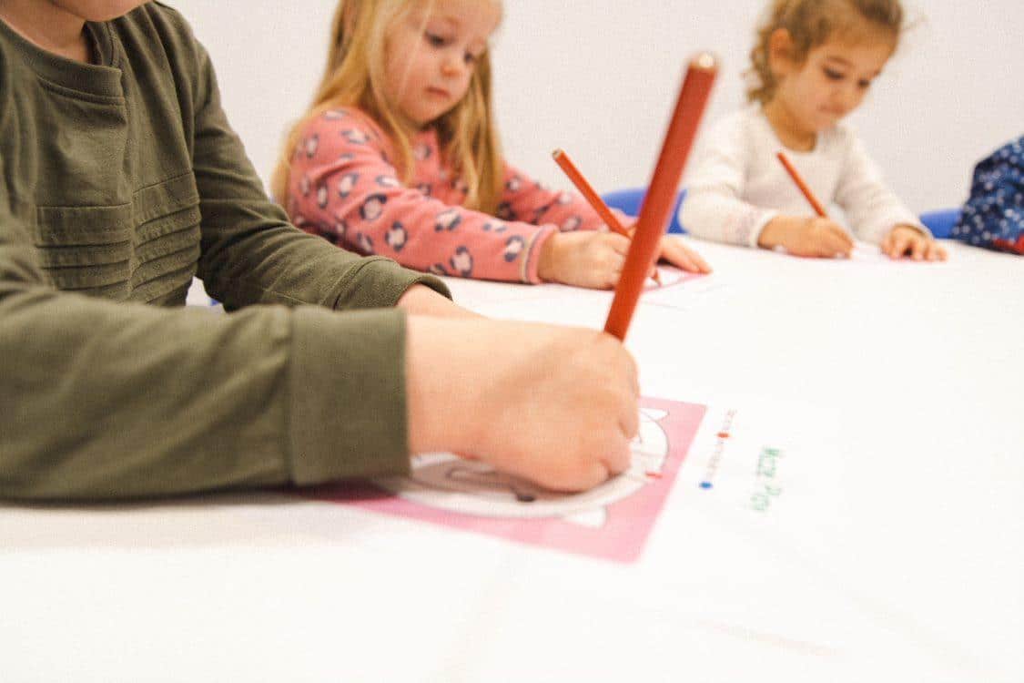 Preschool aged kids in a kinder class in Shichida early learning centre completing mazes