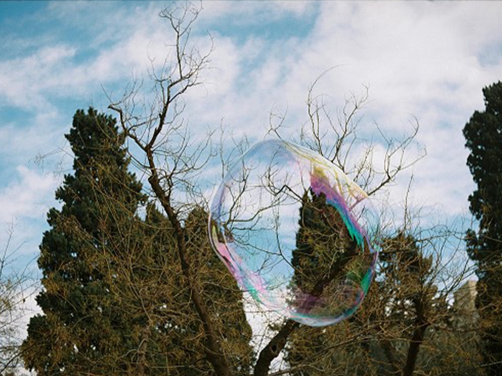A large bubble outside, bubbles are great for Brain Development for Babies