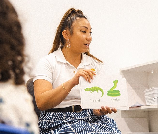 Teacher using flashcards for toddlers as a learning tool, flash cards for kids at Shichida