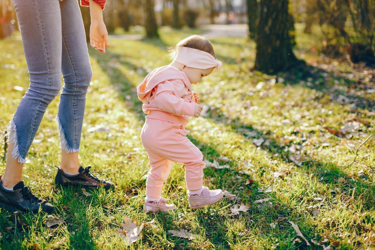 Stylish mother with little daughter
