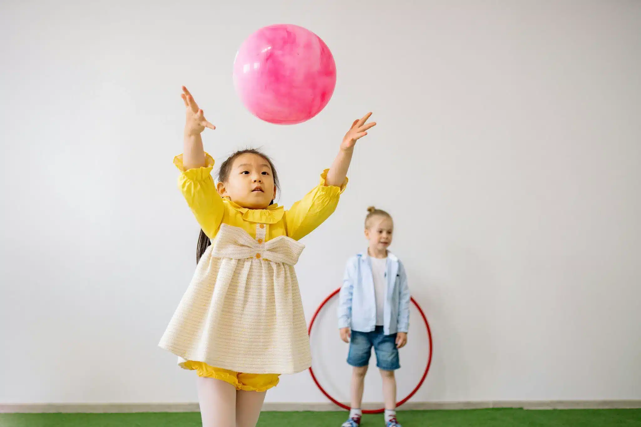 Simple ball play is one of the most fun gross motor skills activities for preschoolers,