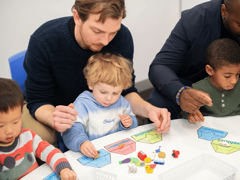 children-learning alongside parent in a Shichida class
