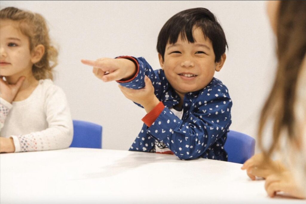 Image by Shichida Australia: A young child fully engaged in a Shichida class, showing excitement during a structured learning session. Confidence building activities for kids, such as interactive sound play, build self-assurance and a love for learning.