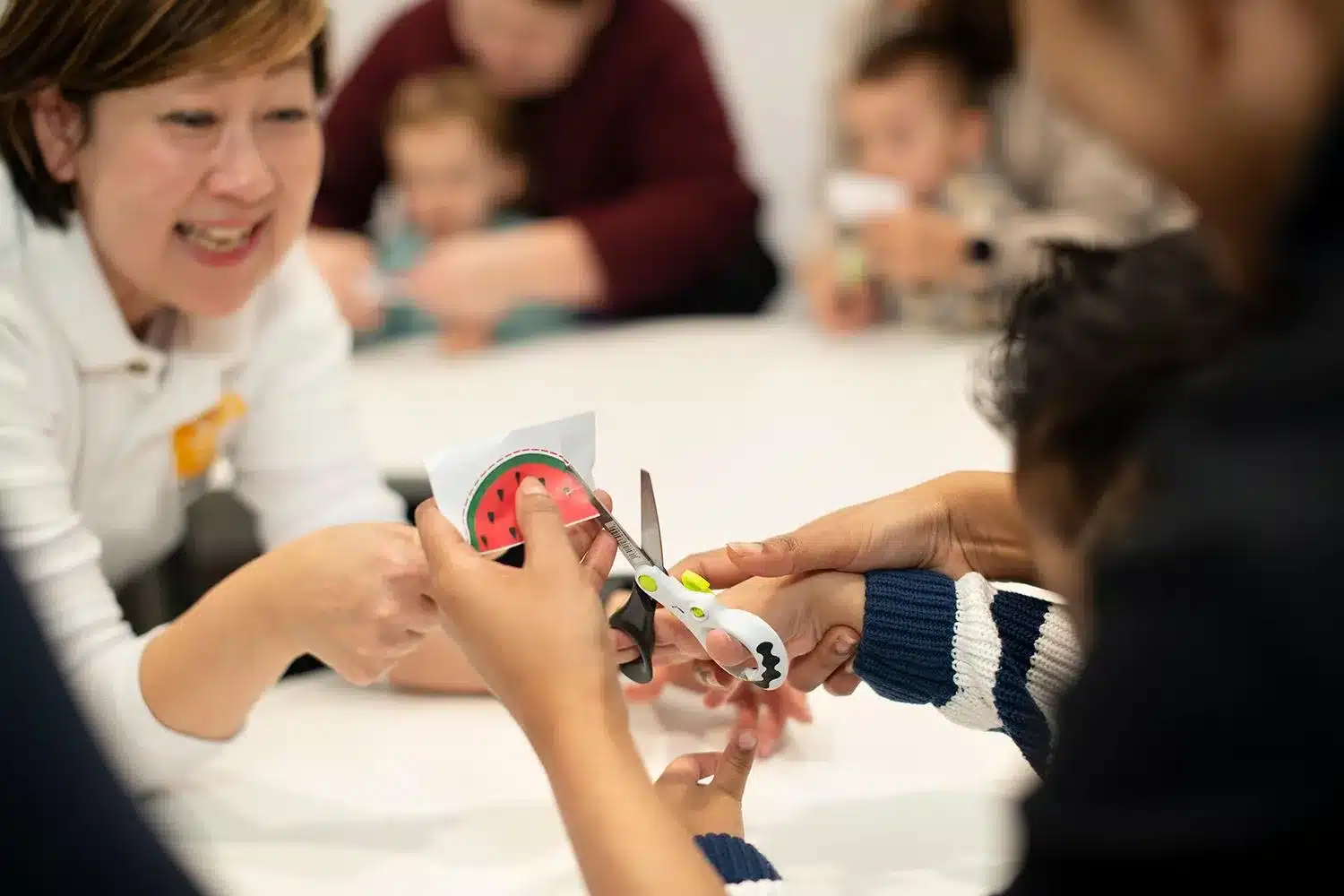 Image by Shichida Australia: Learning to cut along curved lines helps children strengthen fine motor skills, bilateral coordination, and early writing readiness.