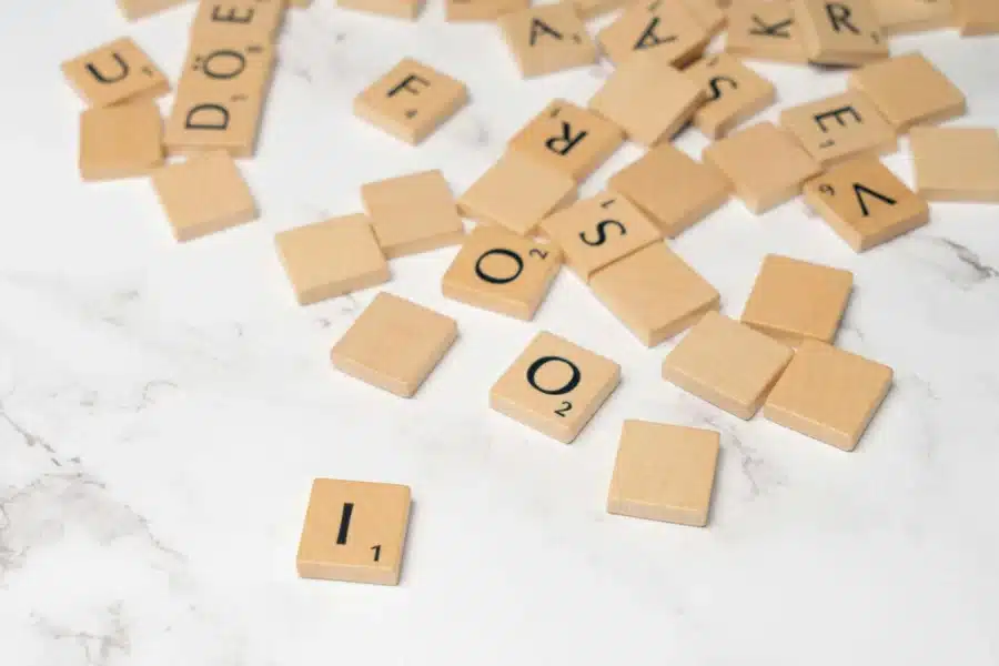 letter recognition games at home - scrabble letter tiles on a table top