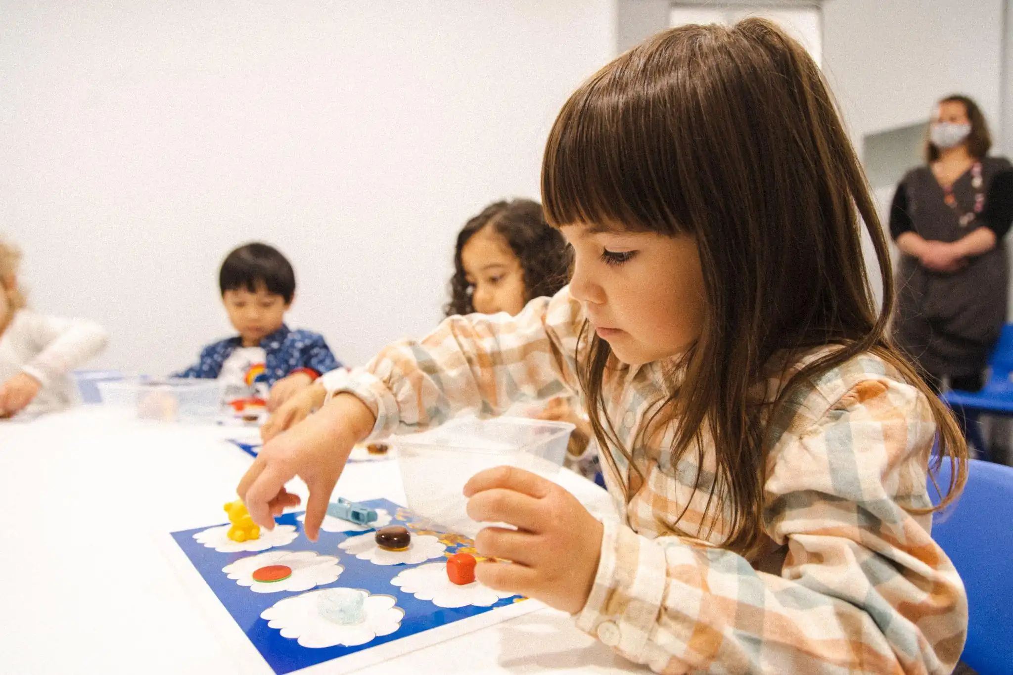 Child engaged in sensory-rich imaginative play